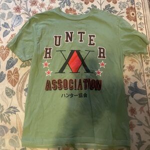 Hot Topic Green Hunter Association Graphic Tee with Red and Black Print